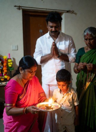 Family doing simple morning puja1