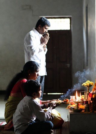 Family doing simple morning puja3