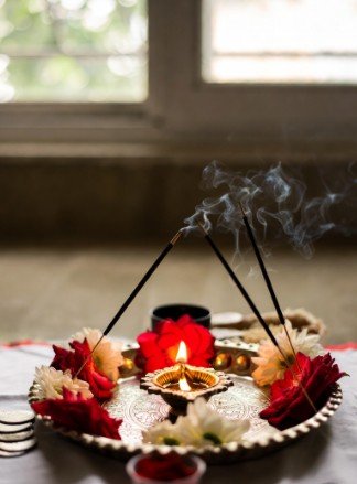 Puja thali with flowers and incense2